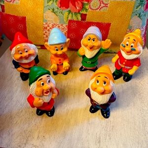 Seven dwarfs plastic dolls. One missing.